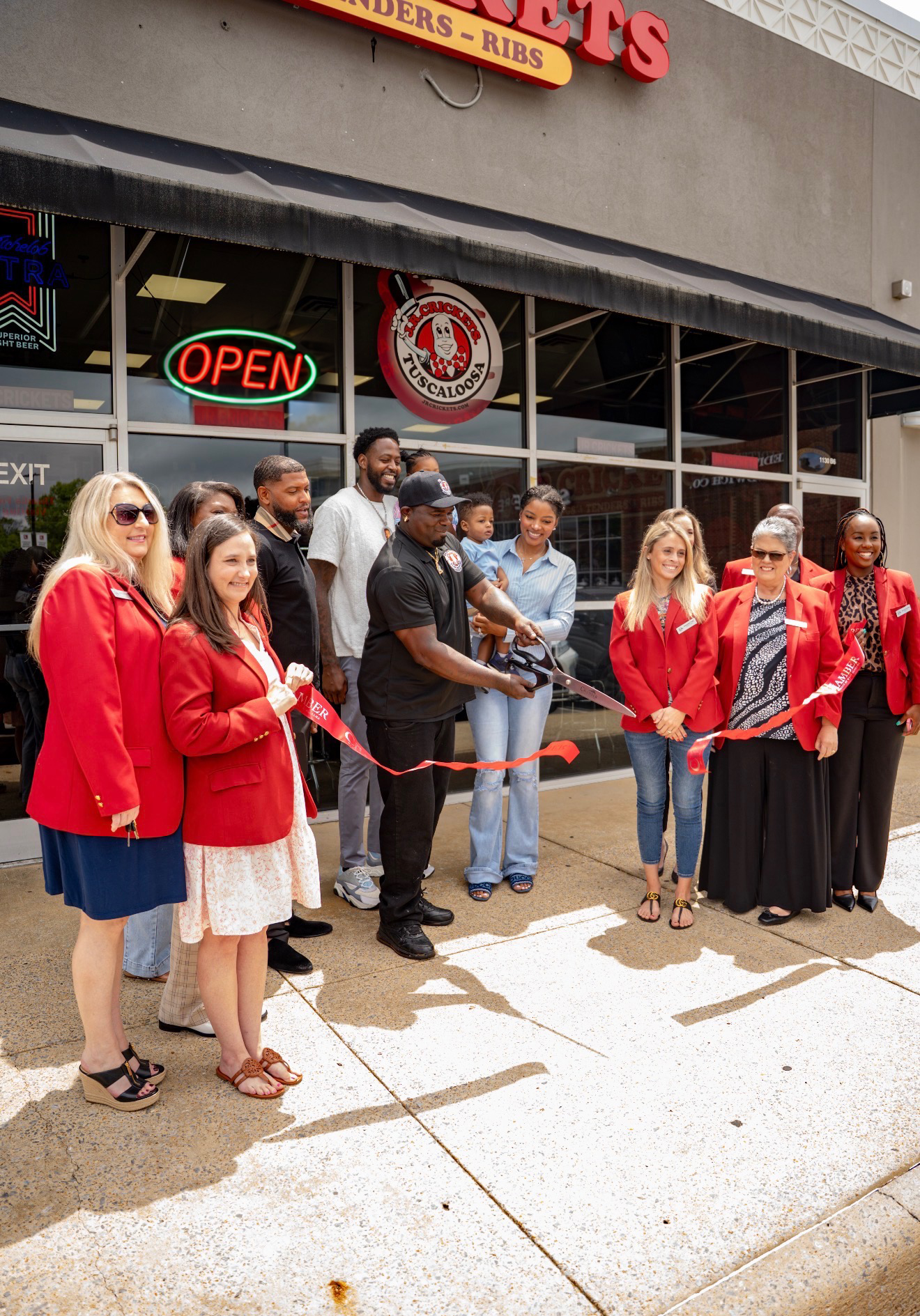 Ribbon cutting at the grand opening of J.R. Crickets Tuscaloosa